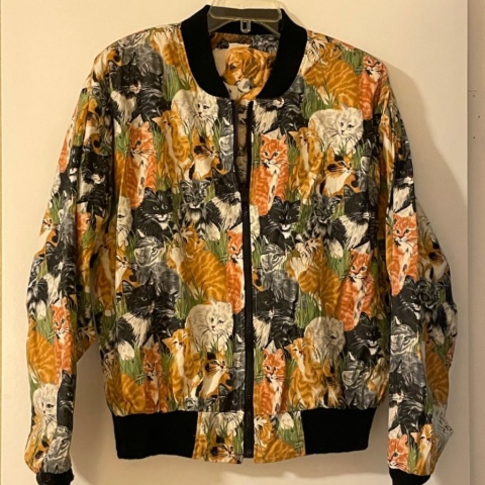 Reversible dog/cat print ladies large jacket.